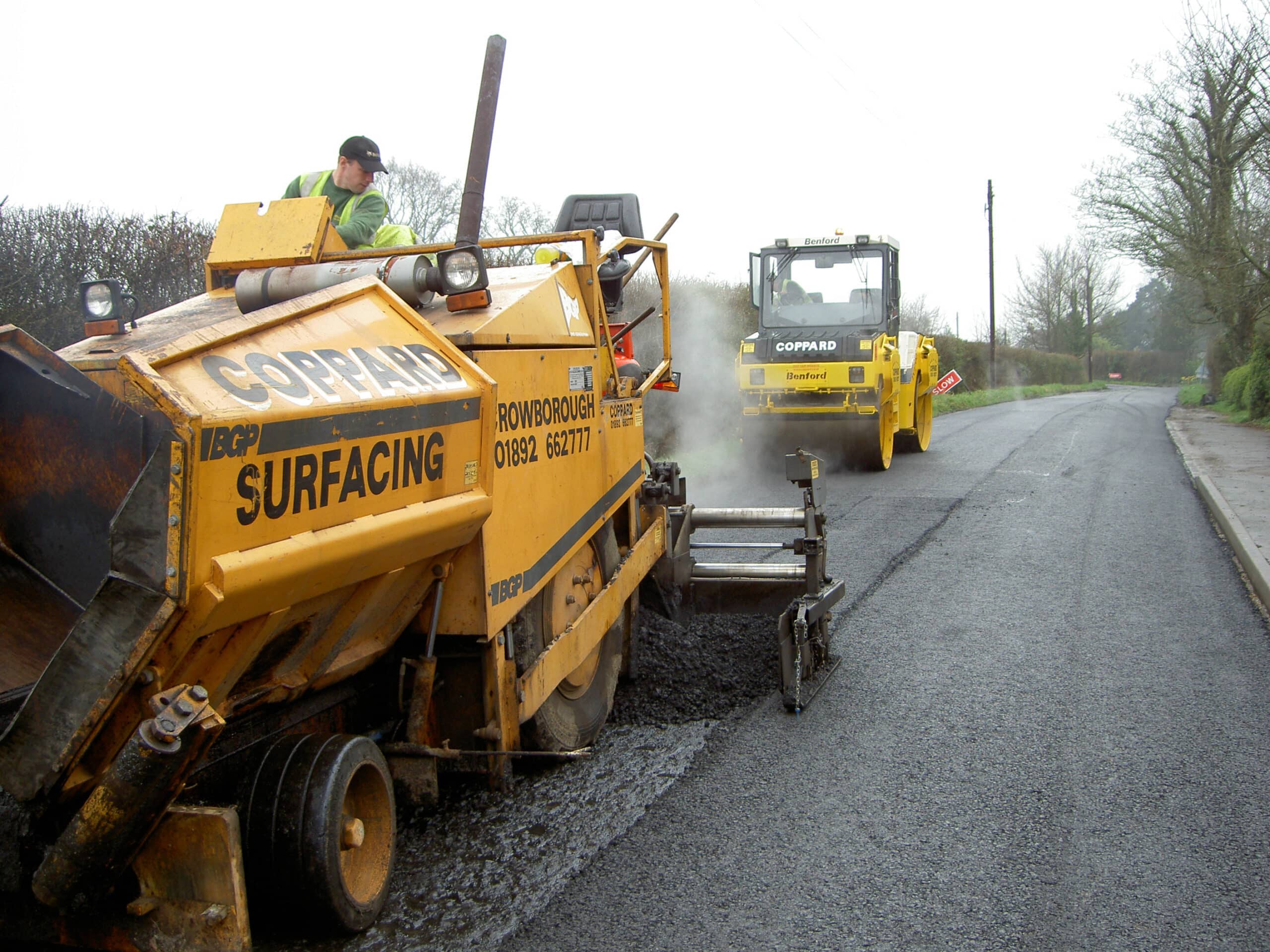 Telescreed paver- Barber Greene BG200 with 2 operators